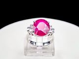 an image of a pink diamond ring on a white plate