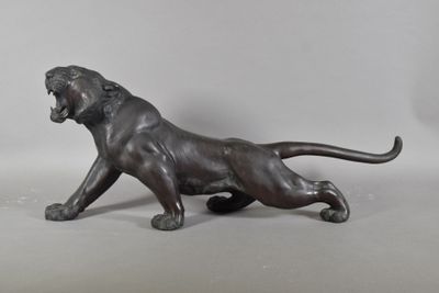 an image of a bronze statue of a lion on a white background
