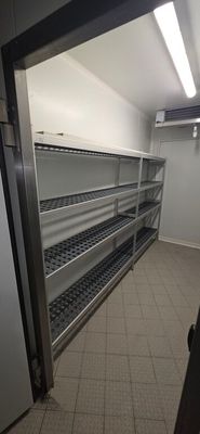 a long row of empty shelves in a room