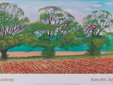 une image représentant un tableau où l'on voit trois arbres dans un champ