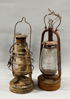 pair of antique keroseanes with glass lamps on stands