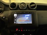 the dashboard of a car with a gps device on it