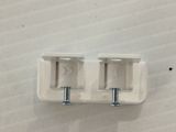 two screws on the side of a white wall