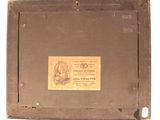 a brown box with a label on it that has a picture of a man on it