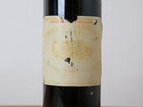 a bottle of wine that is sitting on a table