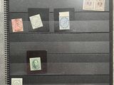 a picture of a display case with a lot of stamps on it
