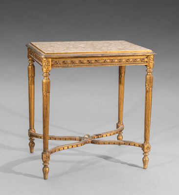 une petite table avec un plateau en marbre posé sur un piètement en bois