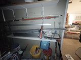 a room that has a bunch of tools on the shelves