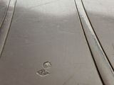 a close up of a metal object on a table