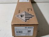 an empty box with a sticker on it sitting on a table