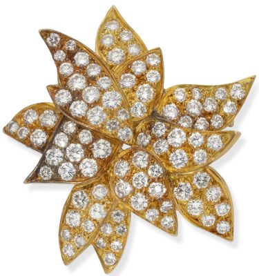 a gold and diamond flower brooch, by van cleef