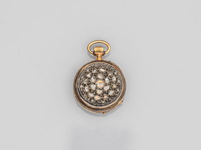 a gold and diamond pocket watch