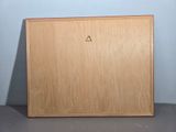 a picture of a wooden box with a triangle on it