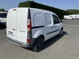 a white van that is parked in a parking lot