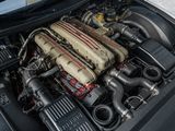 the engine of a car is shown with the hood open
