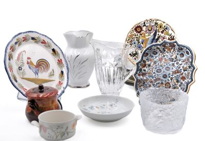 many different types of dishes and vases on the table