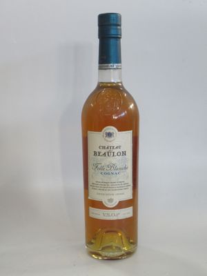 a bottle of alcohol that is sitting on a table