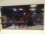 a man taking a picture of himself in the mirror