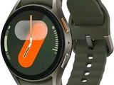 an image of a smart watch with a green band