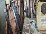 many different types of tools that are hanging on the wall