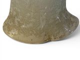 a vase that is sitting on a white surface