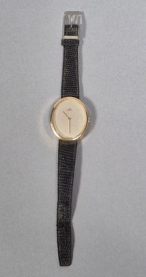 Marcel Rimet Montre en métal doré à mouvement quartz