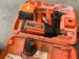 an orange tool case with tools in it on the floor