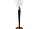 a lamp with a wooden base and a white glass shade
