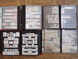 a lot of stamps on a binder on the floor