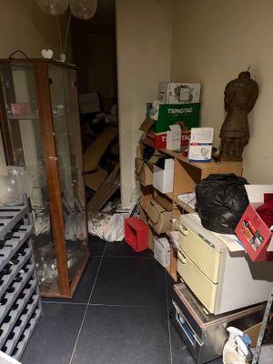 a room with a lot of boxes and boxes on the floor