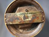 a close up of a rusted metal object on a table