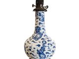 an image of a blue and white lamp with a dragon on it