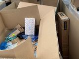 a cardboard box with a lot of items inside of it