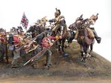 figurines of a group of soldiers on horseback with flags