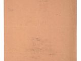an old piece of brown paper with a small hole in the middle
