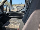 a view of the inside of a vehicle from the driver ' s seat
