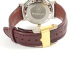 an image of a close up of a wrist watch on a white surface