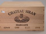 boîte en bois portant une étiquette du Château Siran Margaux