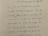 an old handwritten letter from a man who is holding a piece of paper with writing on it