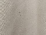 a close up of a piece of cloth with a hole in it