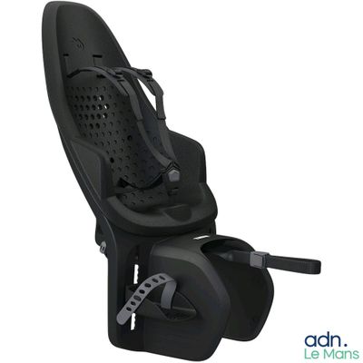 une image représentant un fauteuil inclinable noir muni d'un repose-pieds