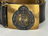 a belt that has a gold buckle on it