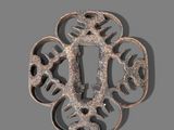 a close up of a metal object on a gray surface