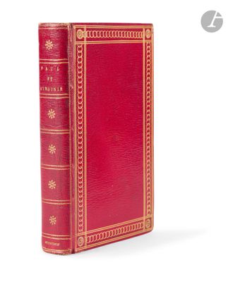 a red book with gold trim and a gold border