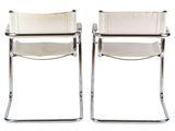 pair of chrome and leather cantile chairs by marcel magotti