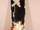 a black and white painting with a red and white cross on it