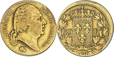 a gold sovereign coin with a crown on top of it