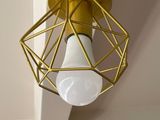 a close up of a light that is on a ceiling