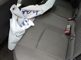 a bag that is sitting in the back seat of a car