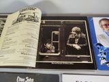 an open book with pictures of a man and a woman on it